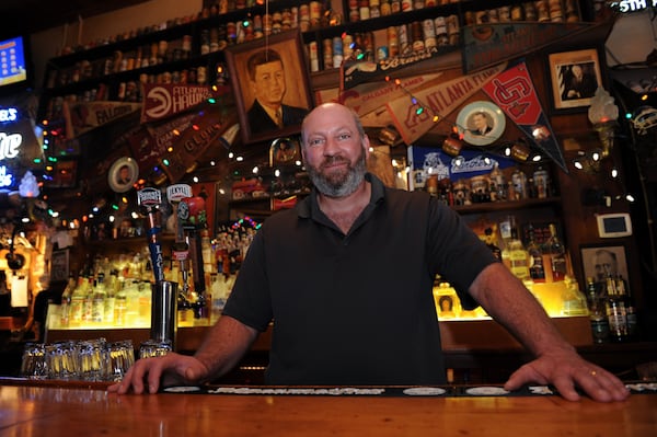 Brian Maloof, the owner of Manuel’s Tavern, said the midtown Atlanta bar was vandalized early Wednesday ahead of a speech that Mayor Andre Dickens delivered to Democratic supporters. (Becky Stein/beckystein.com)