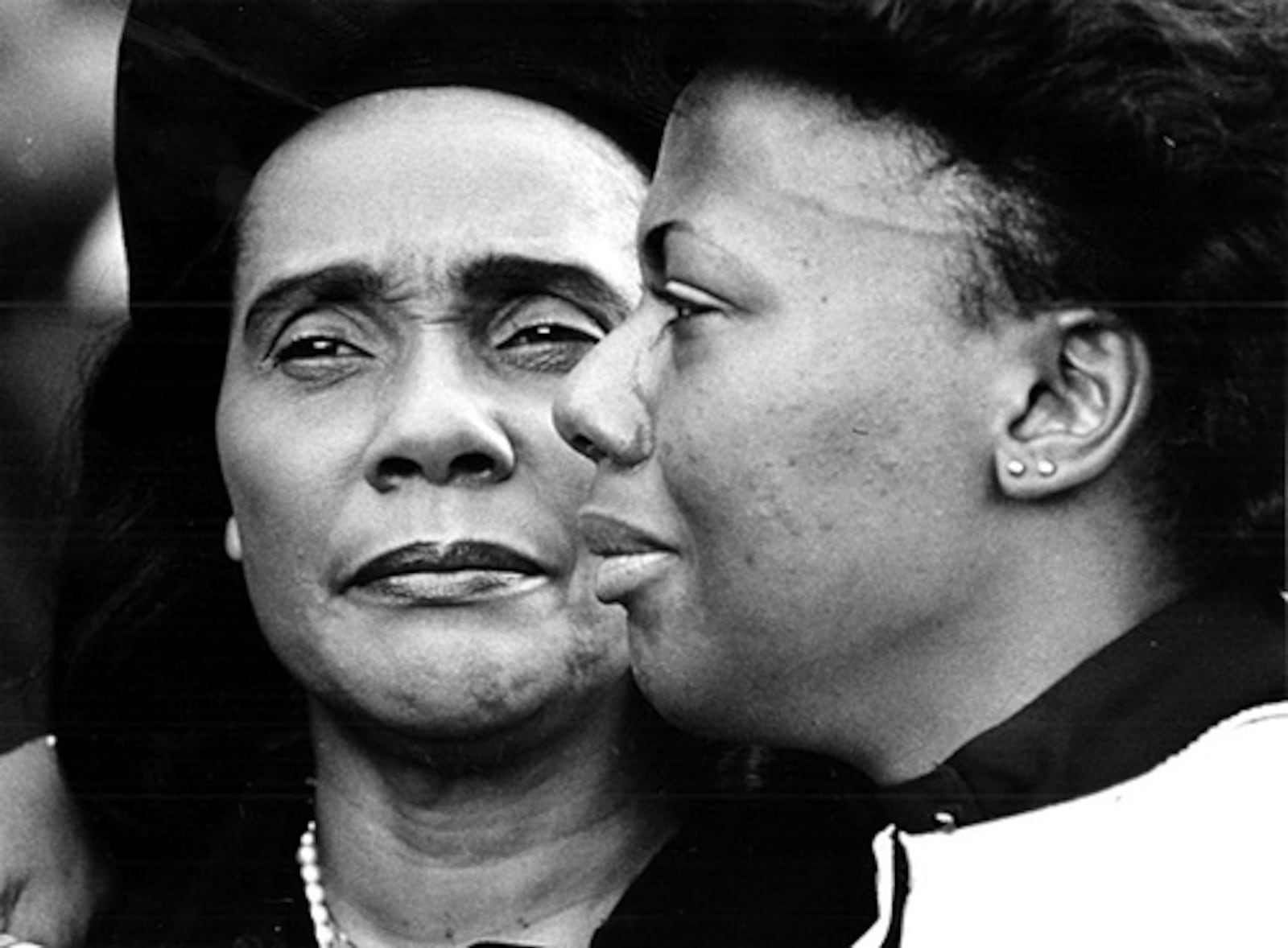 Bernice King, left with her mother Coretta Scott King at the 1984 funeral of her grandfather Martin Luther “Daddy” King in front of the funeral site at Ebenezer Baptist Church. (W.A. Bridges Jr/AJC staff) 1984