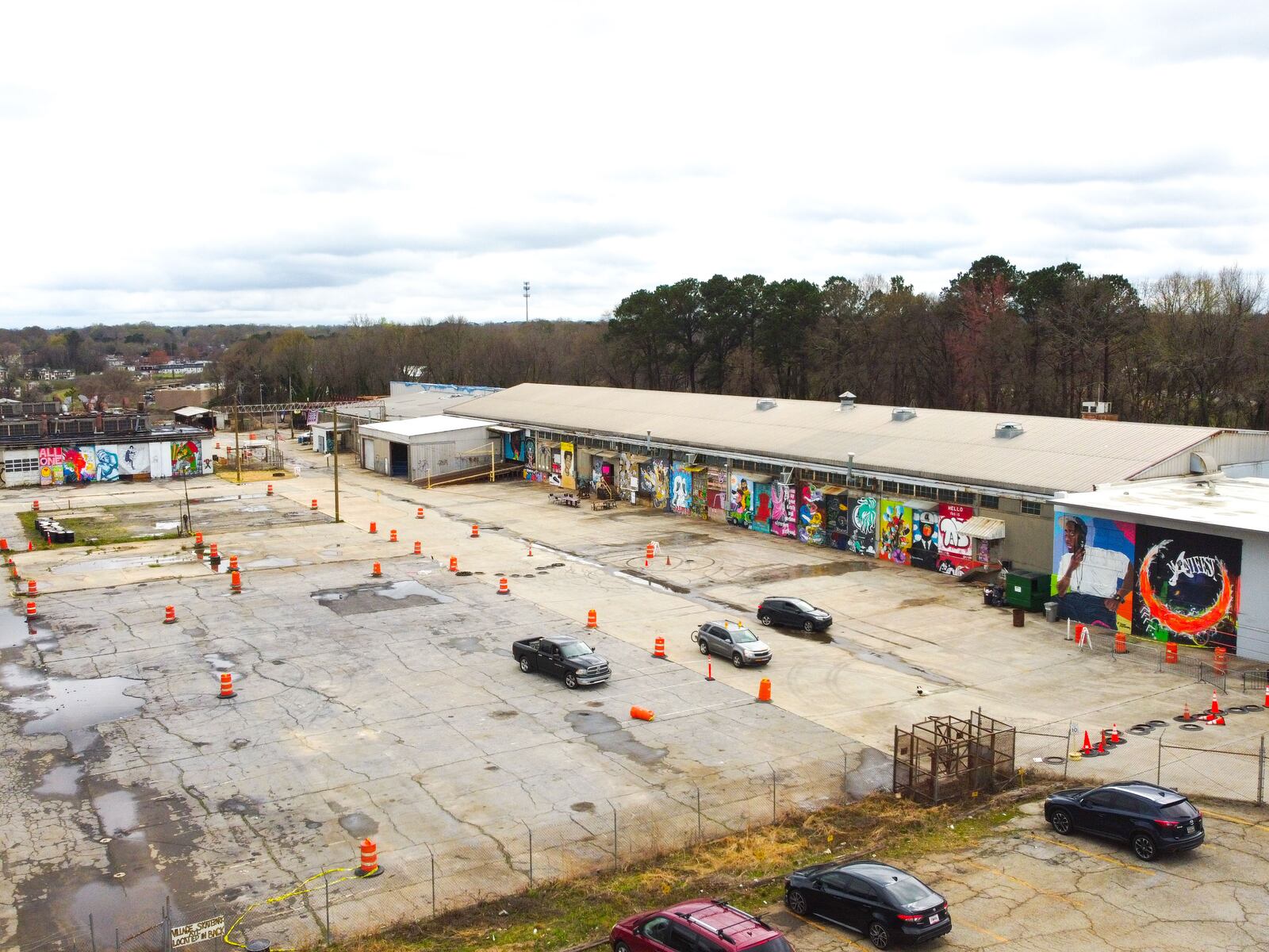 A drone shot shows the outdoor gallery on Donald Lee Hollowell Parkway.