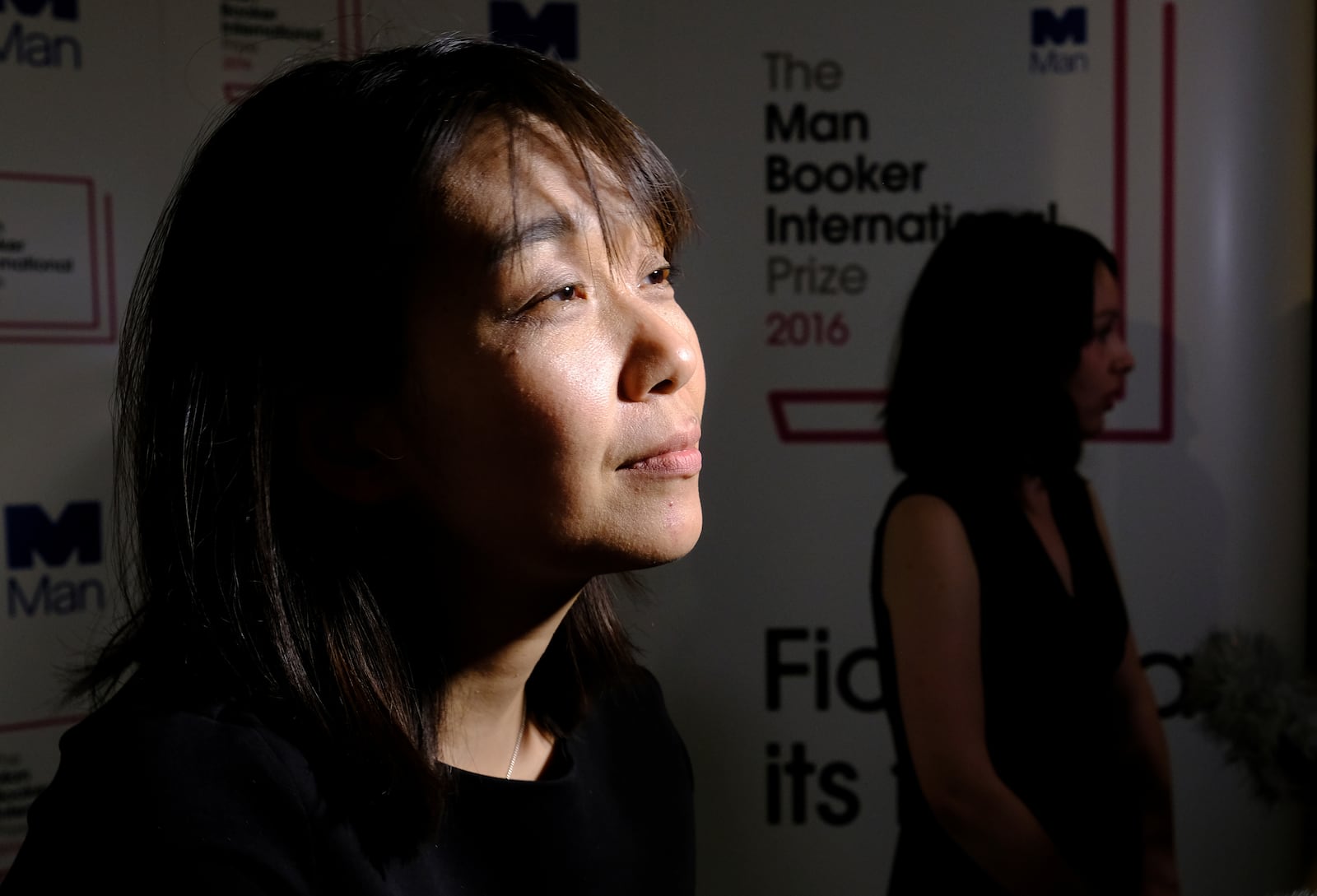 FILE - Han Kang speaks to the media after winning the Man Booker International prize for fiction for her book 'The Vegetarian' in London, Tuesday, May, 16, 2016. Kang has won the Nobel Prize for Literature. (AP Photo/Alastair Grant, File)