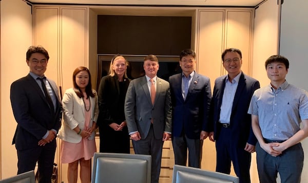 State of Georgia officials recently met with SungEel HiTech officials in South Korea. Pictured from left to right are SungEel America executive Sukjae Yim; Georgia Department of Economic Development Korean Projects Director Yoonie Kim; Brittany Young, chief operating officer of the Georgia Department of Economic Development; Georgia Department of Economic Development Commissioner Pat Wilson; SungEel HiTech CEO KangMyung Yi and SungEel executives Dongsuck Lee and Ben Seo. SPECIAL to the AJC