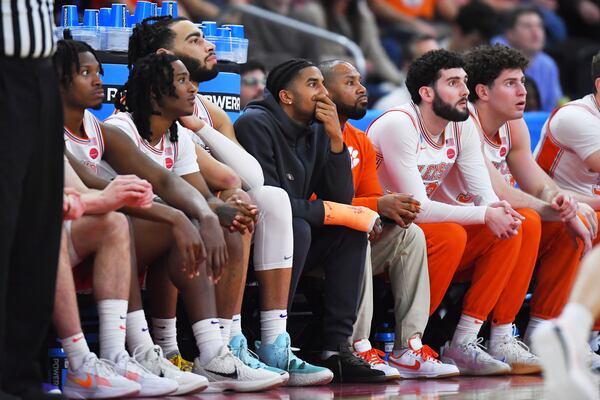 Clemson players watch the game while trailing McNeese State during the second half in the first round of the NCAA college basketball tournament, Thursday, March 20, 2025, in Providence, R.I. (AP Photo/Steven Senne)