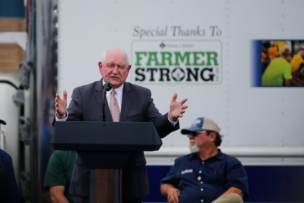 Doubts have now been raised about whether Gov. Brian Kemp will continue to push for former Gov. Sonny Perdue, pictured, to take over as chancellor of the state's higher education system now that Perdue's first cousin, former U.S. David Perdue is campaigning to defeat Kemp in the GOP primary. (AP Photo/Nell Redmond)