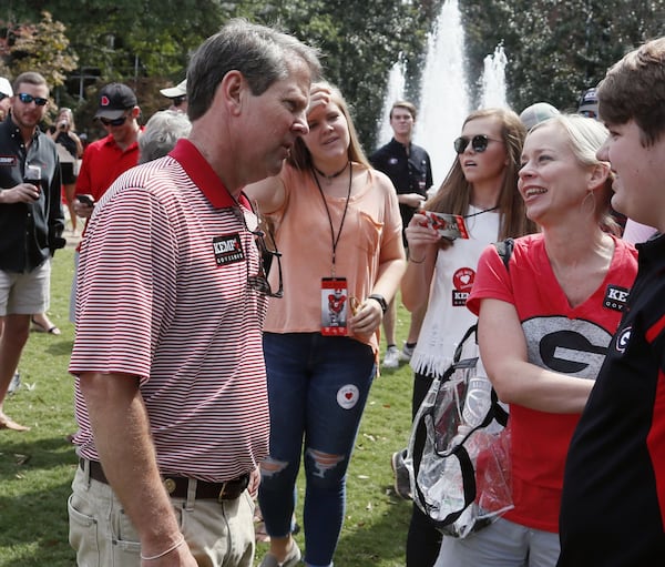 Brian Kemp, the Republican candidate for governor, campaigns at a young Republicans tailgate party at the University of Georgia. BOB ANDRES /BANDRES@AJC.COM