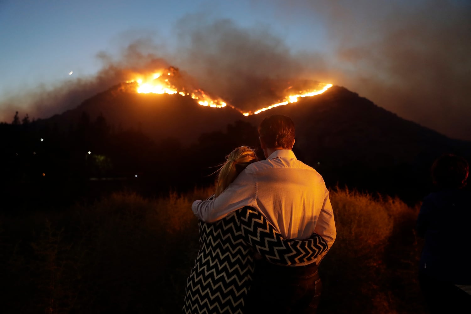 Photos: Deadly wildfires blaze through northern, southern California