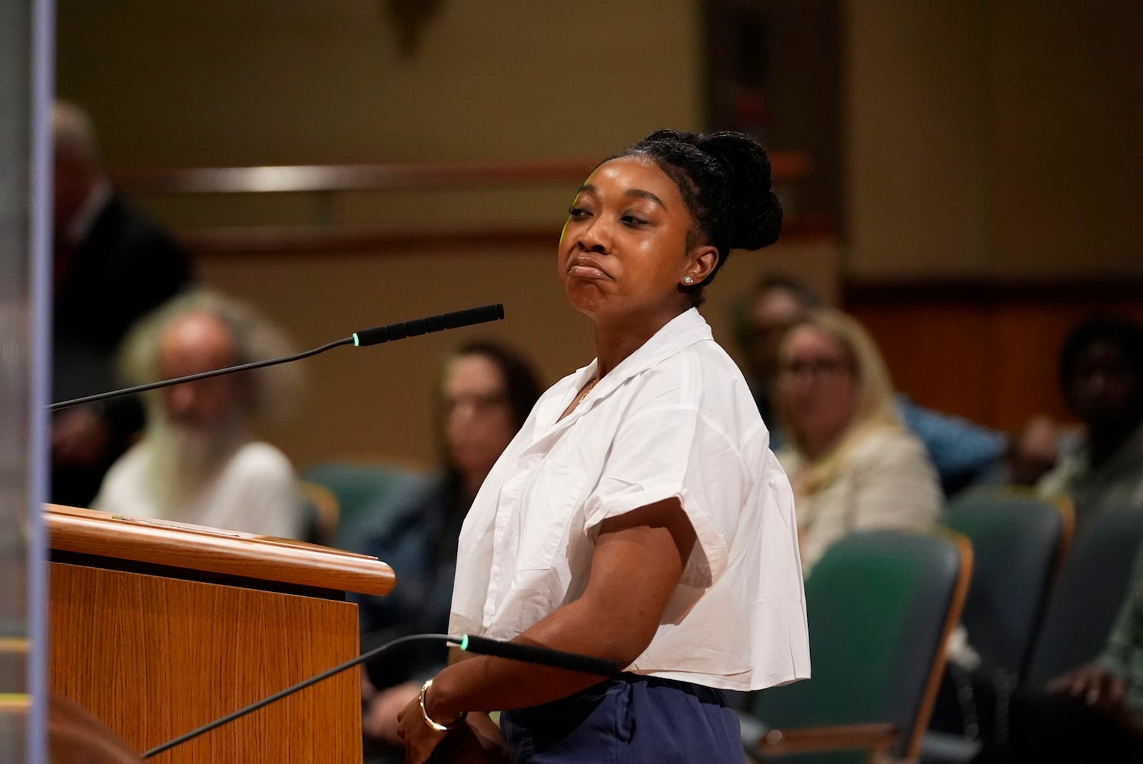 Simone Haley, granddaughter of Oretha Castle Haley, speaks during a city council hearing regarding the dispute over her grandmother's former home and plans by others to create a museum, in New Orleans, Thursday, Oct. 24, 2024. (AP Photo/Gerald Herbert)