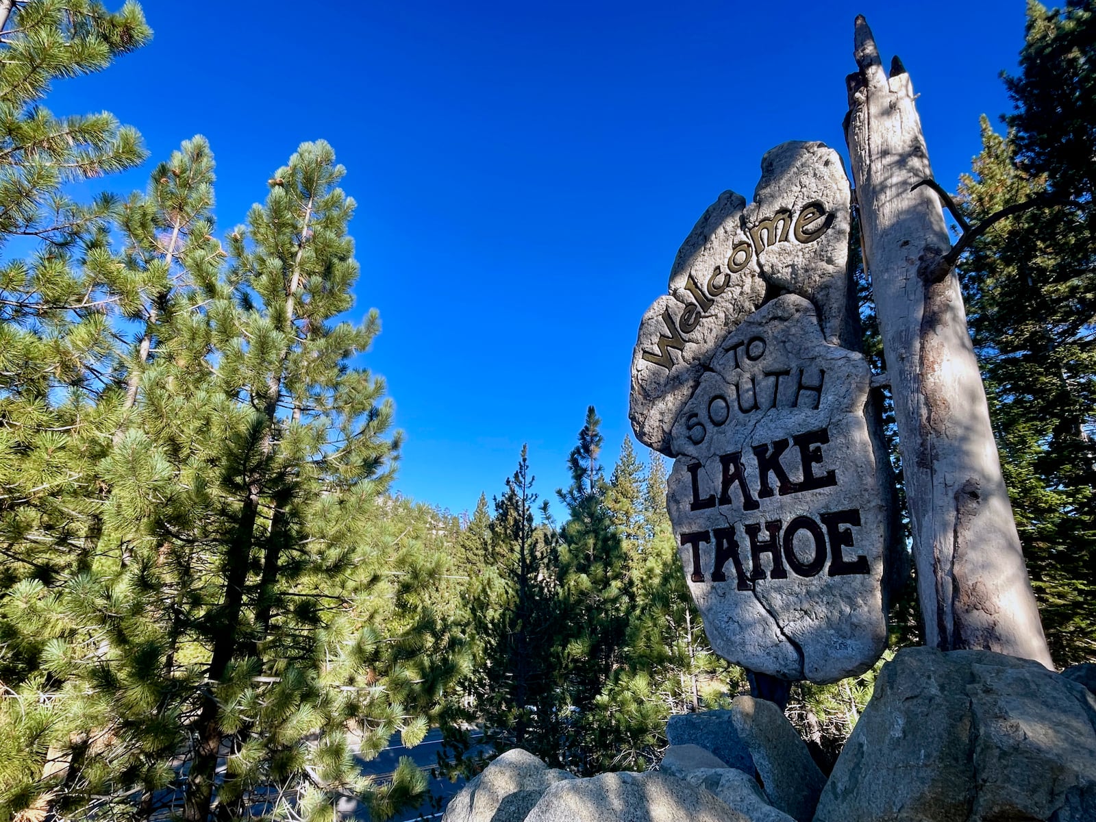 A sign welcomes motorists to South Lake Tahoe, Calif. on Friday, Oct. 18, 2024, where voters will decide whether to approve Measure N, which will mandate a tax to homeowners who leave their homes vacant for more than half the year. (AP Photo/Haven Daley)