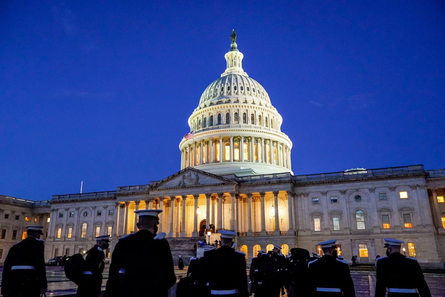 Members of the military band arrive at the U.S. Capitol in Washington on Wednesday morning, Jan. 20, 2021, hours before the presidential inauguration of Joe Biden. (Amr Alfiky/The New York Times)