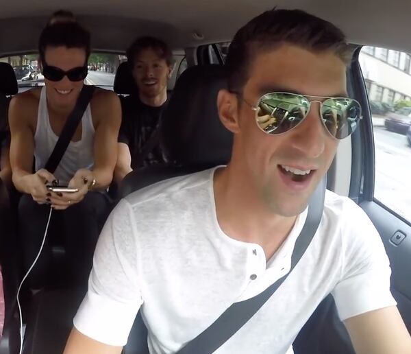 Michael Phelps in the driver's seat during the US Swim Team's Atlanta car karaoke session.