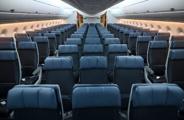 Photo shows the newly deigned main cabin during a media preview of an Airbus A350 at Delta TechOps, Friday, January 24, 2025, in Atlanta. Delta unveiled a new cabin design on Tuesday, featuring improved lighting, seating and refreshed branding elements. (Hyosub Shin / AJC)