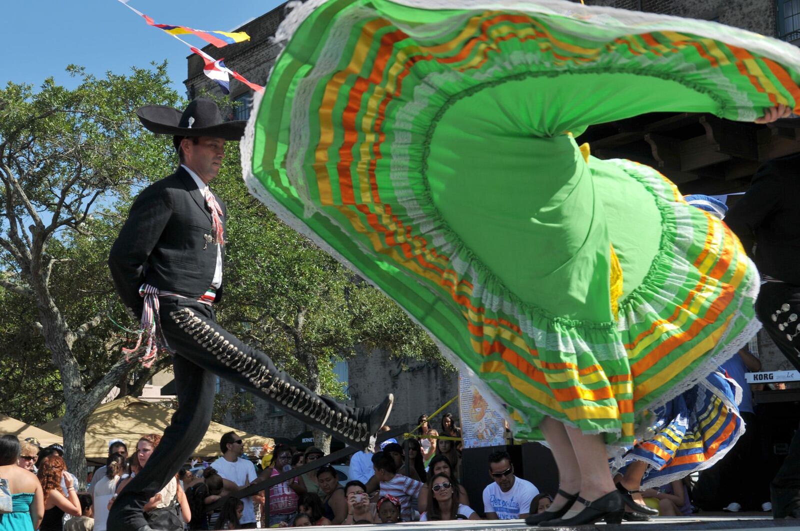 Tradicion Latina performs a Mexican dance during the Fiesta Latina on Saturday, September 15, 2012 at Rousakis Plaza on River Street.