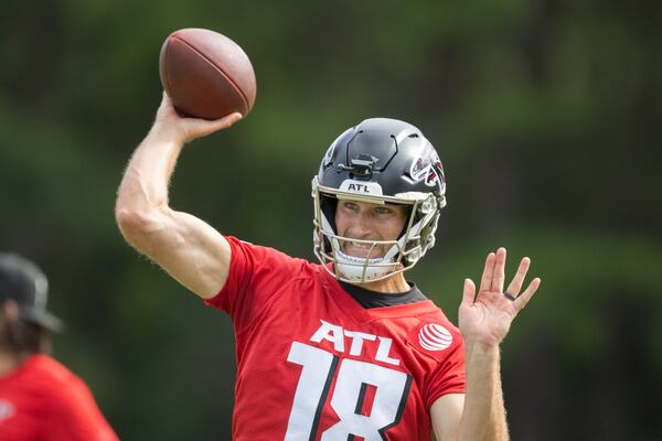 Falcons quarterback Kirk Cousins (18) practices during training camp at the Falcons’ headquarters in Flowery Branch on Friday, July 26, 2024. (Arvin Temkar / AJC)