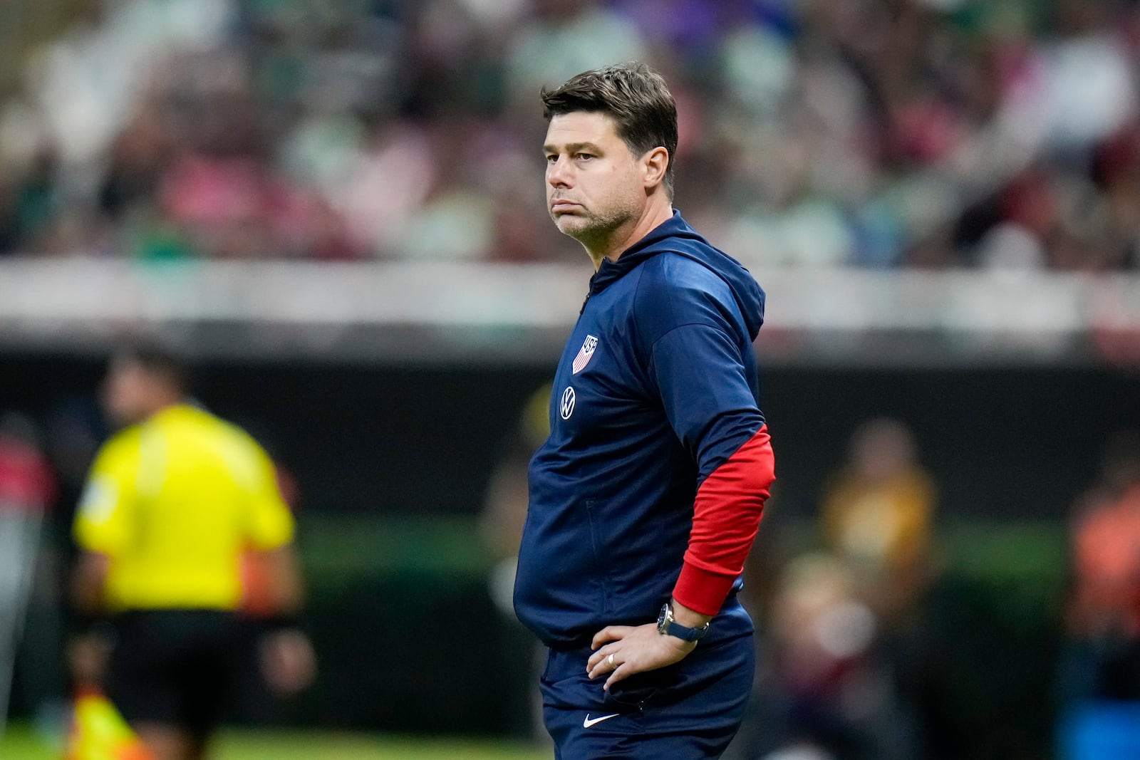 The United States' coach Mauricio Pochettino stands in the sideline during an international friendly soccer match against Mexico at Akron Stadium in Guadalajara, Mexico, Tuesday, Oct. 15, 2024. (AP Photo/Eduardo Verdugo)