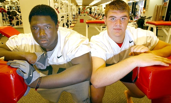 Max Jean-Gilles, left, and Daniel Inman, right, pose for a portrait at the University of Georgia on Aug. 6, 2003. Both offensive tackles, Jean-Gilles and Inman will have to step in to replace first-round NFL draft picks.  (Sunny Sung/AJC file)