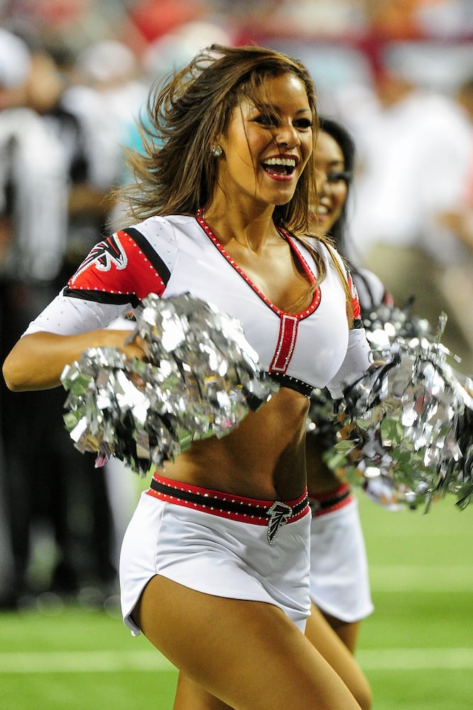 NFL cheerleaders perform at preseason games