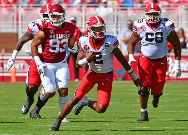 Georgia quarterback D'Wan Mathis (2) runs the ball during the Bulldogs' game with Arkansas in Fayetteville, Ark., on Saturday, Sept. 26, 2020. (Photo by Kevin Snyder)