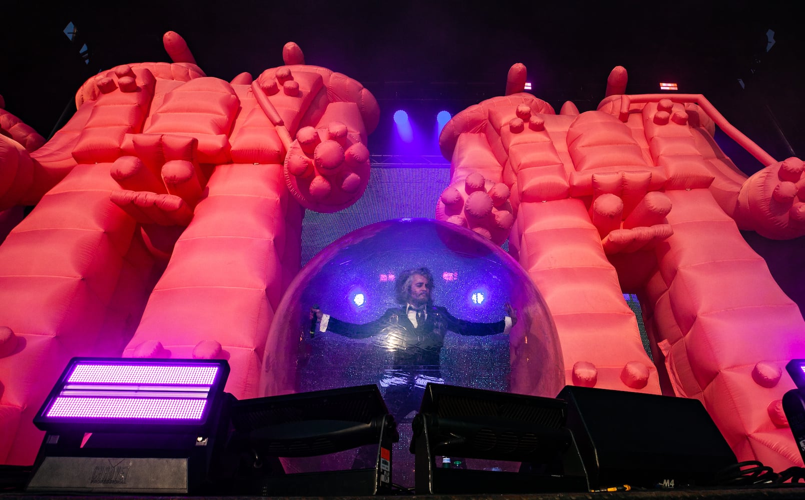 The Flaming Lips, featuring the lead singer in a bubble and inflatable giant robots on the Piedmont Stage, perform on the final day of the Shaky Knees Music Festival at Atlanta's Central Park on Sunday, May 7, 2023. (RYAN FLEISHER FOR THE ATLANTA JOURNAL-CONSTITUTION)