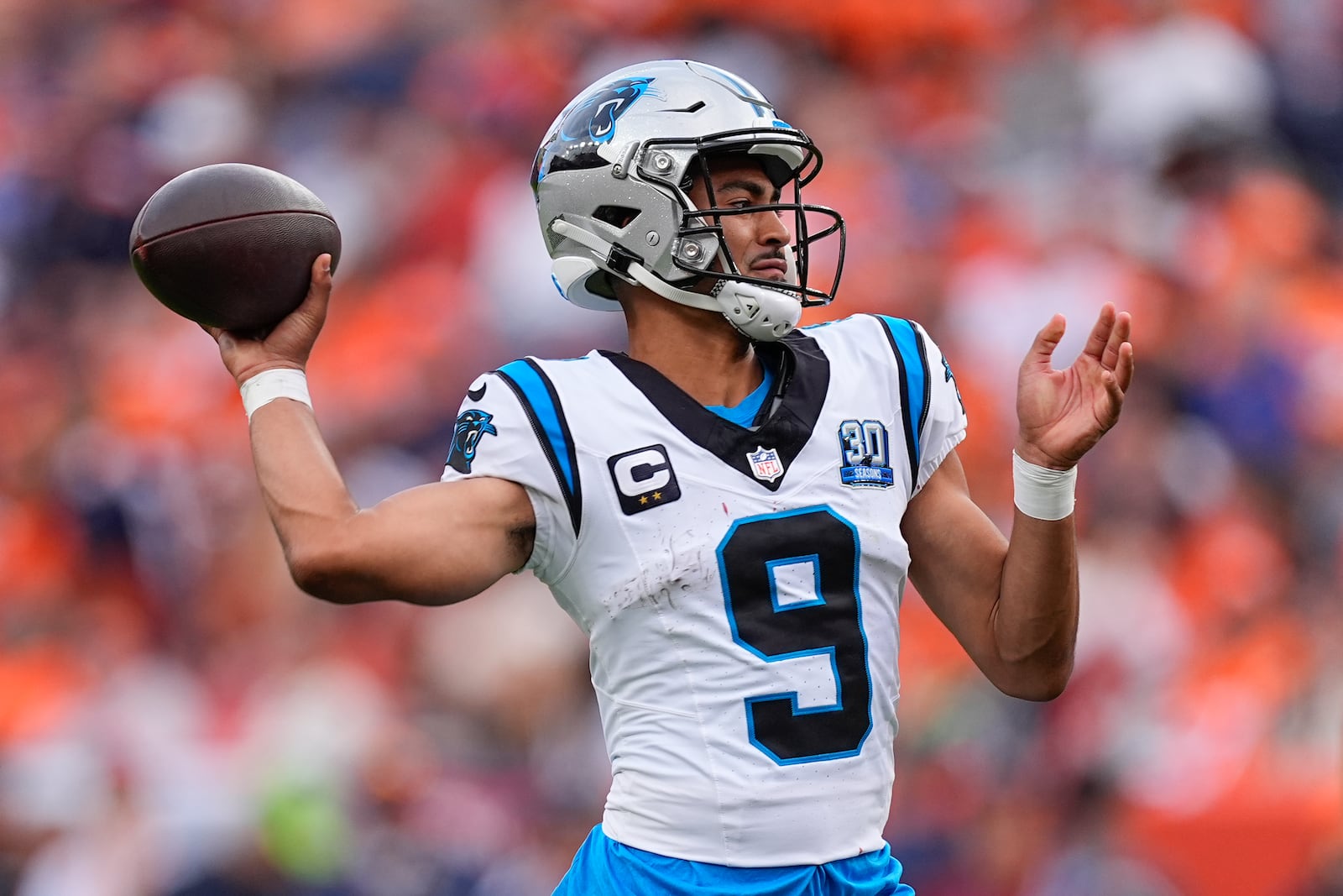 Carolina Panthers quarterback Bryce Young throws during the second half of an NFL football game against the Denver Broncos, Sunday, Oct. 27, 2024, in Denver. (AP Photo/David Zalubowski)