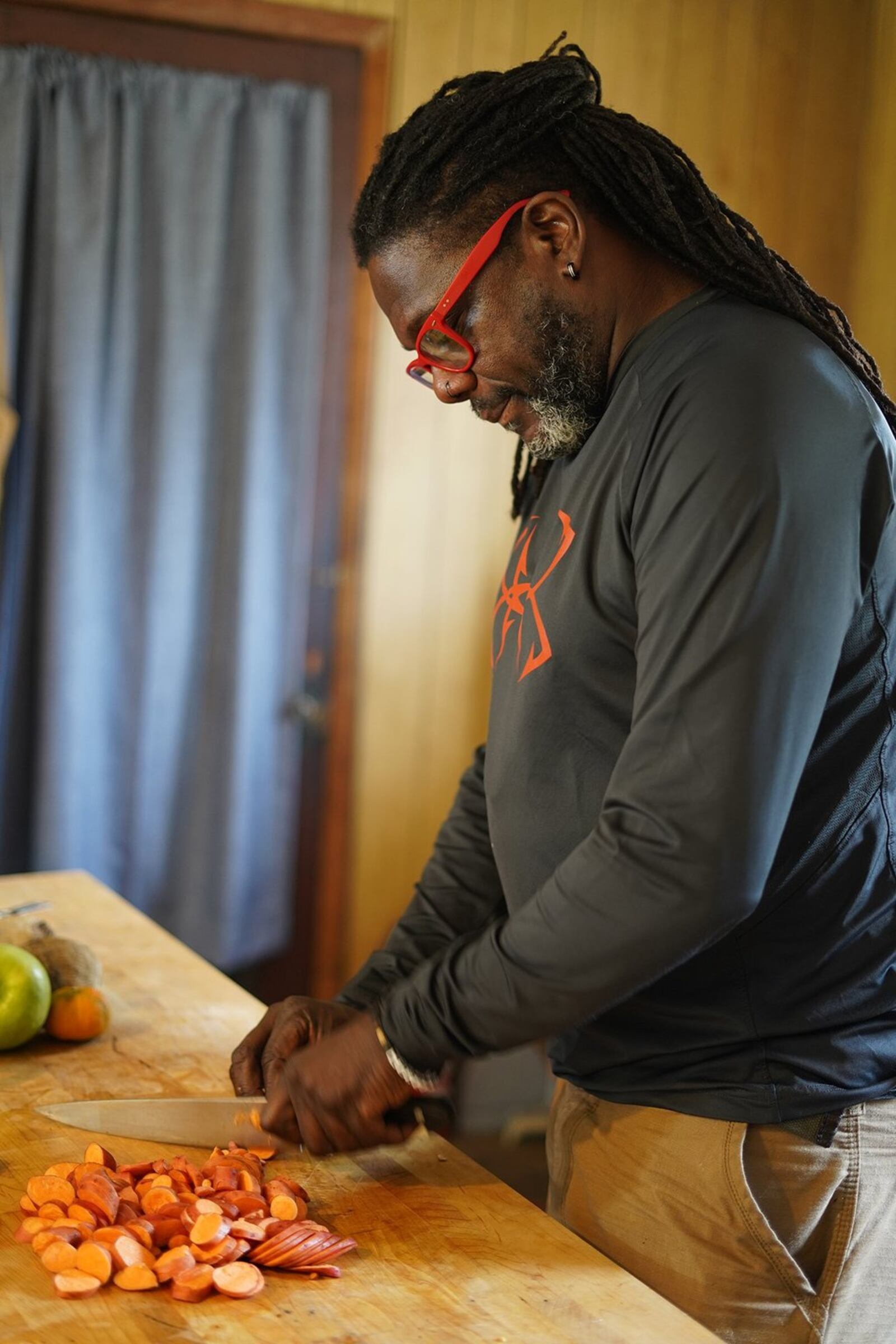 Old ways meet new technology in chef Matthew Raiford’s kitchen as he prepares Satsuma Orange Glazed Sweet Potatoes. An Instapot gives Raiford more time for his work on the farm. CONTRIBUTED BY SANJEEV AND UMA CHATTERJEE