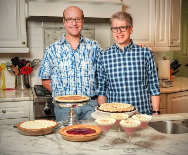 Paul Arguin (left) and Chris Taylor are married Atlanta doctors who have a knack for making pies. Besides earning more than 500 trophies and ribbons on the amateur baking competition circuit, they’re known for their cookbook “The New Pie: Modern Techniques for the Classic American Dessert” (Clarkson Potter, $30). CONTRIBUTED BY CHRIS HUNT PHOTOGRAPHY