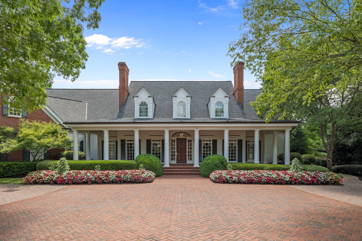 Over 1.5 acres of lush landscapes bring the low country to East Cobb