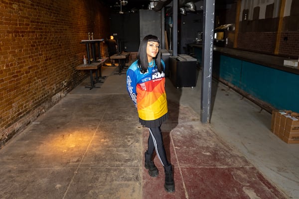 Ree De La Vega, who has taken over the lease of former restaurant and lounge The Sound Table, poses for a portrait in the space as it is renovated in Atlanta on Tuesday, April 16, 2024. (Arvin Temkar / arvin.temkar@ajc.com)