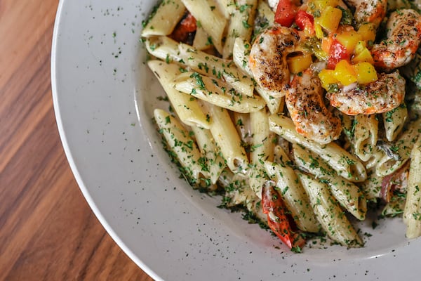 Life Bistro is known for their Seafood Rasta Pasta. (Natrice Miller / natrice.miller@ajc.com)