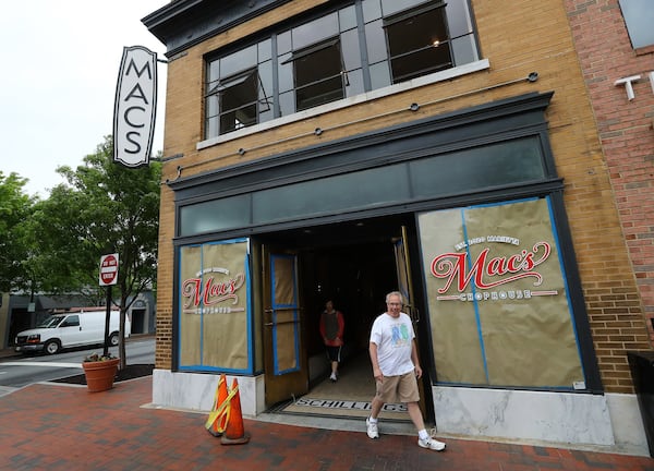 April 29, 2020 Marietta: Former Cobb County Commission Chairman and Georgia Attorney General Sam Olens leaves after stopping in to check out the finishing touches on Mac’s Chophouse restaurant on Wednesday, April 29, 2020, in Marietta. Renovations are almost done at the space that once housed Shillings on Marietta Square. Curtis Compton ccompton@ajc.com