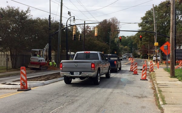 Medians being built along Martin Luther King Jr. Drive in southwest Atlanta have been a sore spot for many residents, keeping them from easily getting to their homes. (Photo by Bill Torpy)