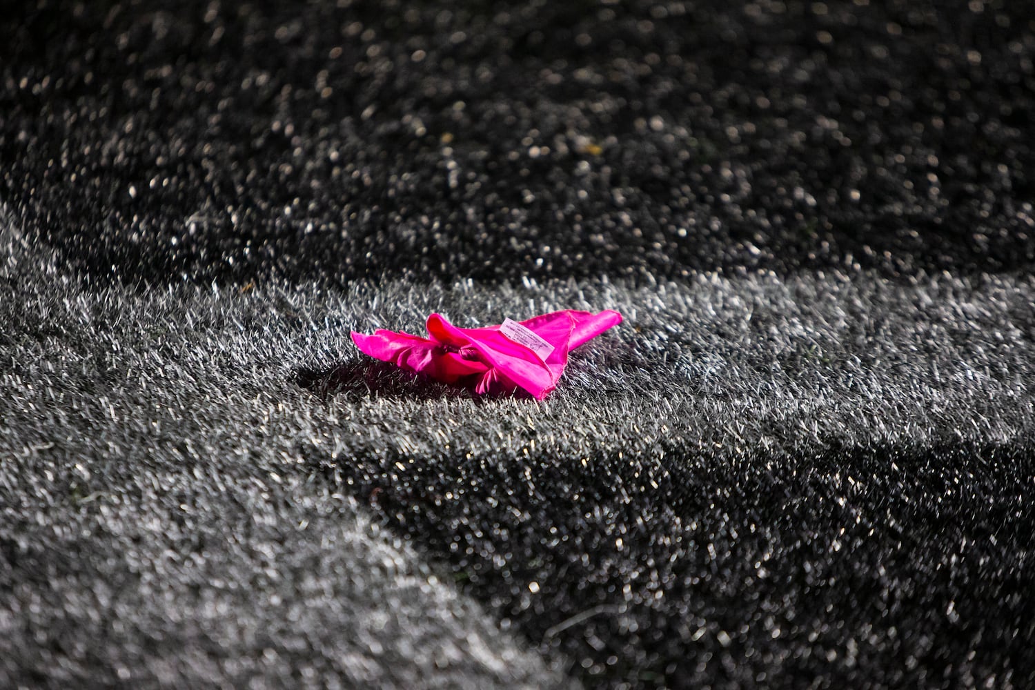 Referees throw pink flags for breast cancer awareness during the Alpharetta vs. Blessed Trinity high school football game on Friday, October 28, 2022, at Alpharetta high school in Alpharetta, Georgia. Alpharetta led Blessed Trinity 21-7 at the end of the first half.