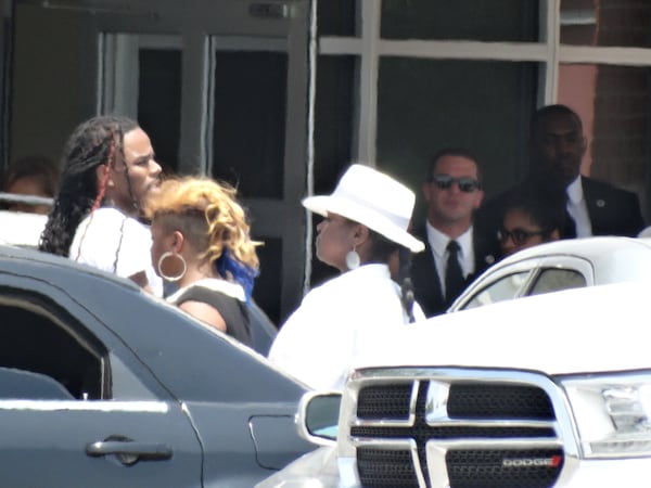 Leolah Brown (in white hat) at Bobbi Kristina's service. CREDIT: Rodney Ho/rho@ajc.com