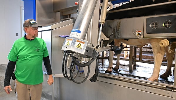 Milking robots made by DeLaval replaced the human operated milking parlor at Hillcrest Farms in Dearing, Ga., a fourth-generation American family dairy farm owned and operated by Mark Rodgers and his family since 1941. Hillcrest Farms is Georgia's first robotic dairy, but others are being added as technology changes agriculture. (Hyosub Shin / Hyosub.Shin@ajc.com)