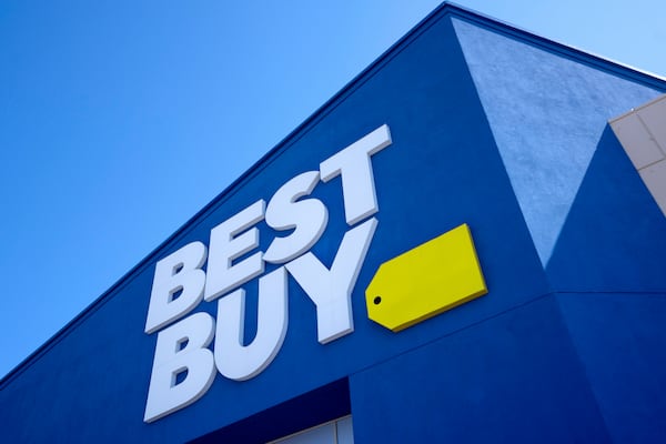 FILE - A Best Buy logo is shown at a store in Dallas on Oct. 25, 2024. (AP Photo/Tony Gutierrez, File)