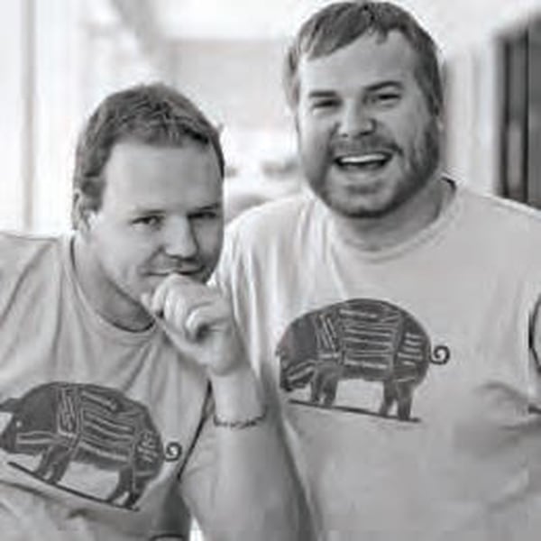 Robert Owens (right) and Gregory Vivier, Grand Champion BBQ. CONTRIBUTED BY GRAND CHAMPION BBQ