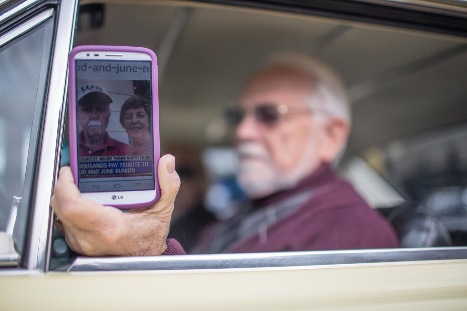 Classic cars escort slain couple to the cemetery