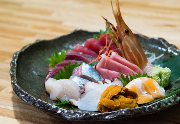 Sashimi Taku Jyo, a selection of sashimi that included Bigeye tuna, fatty tuna (Toro), sea scallop, octopus and sea urchin roe (Uni) at Sushi Hayakawa. CONTRIBUTED BY HENRI HOLLIS