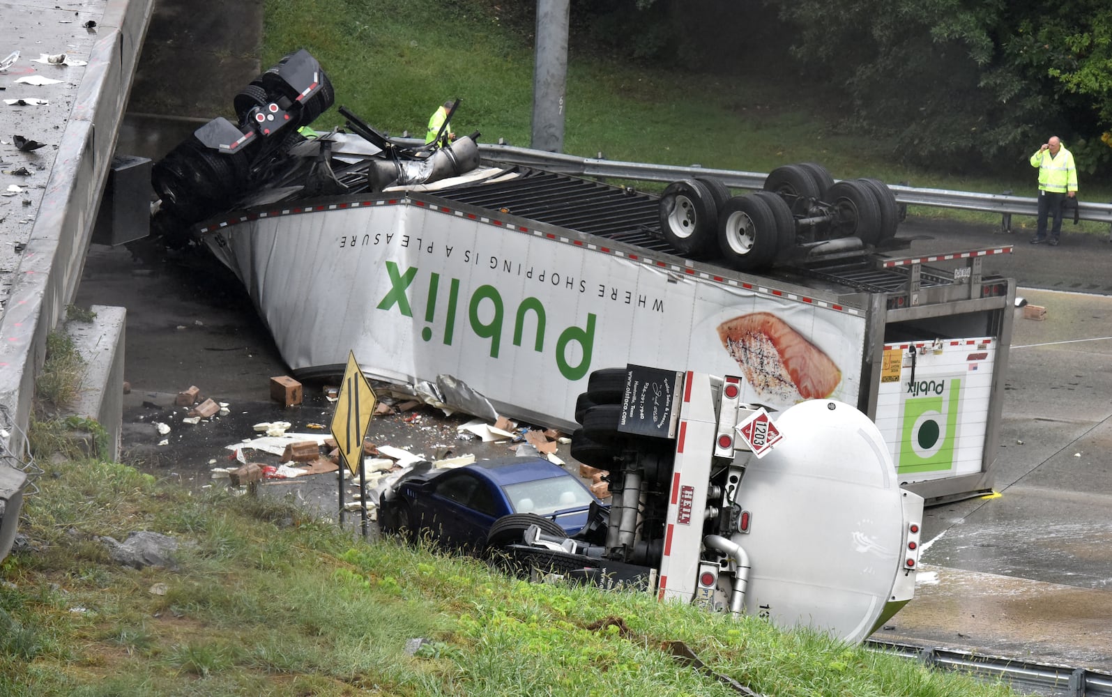 I-285 crash: Trucks plunge off interstate onto Ga. 400