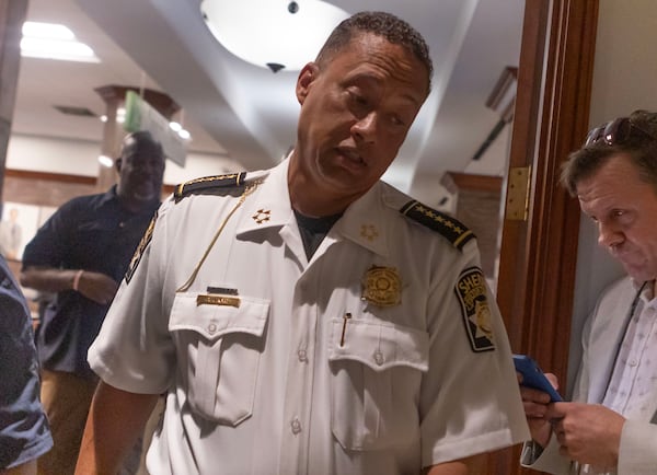 Fulton County Sheriff Patrick Labat walks back to his office after speaking to the press during the grand jury hearing for former President Trump at Fulton County Courthouse on August 14, 2023 in Atlanta. (Michael Blackshire/Michael.blackshire@ajc.com)