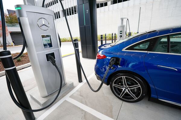 A Mercedes-Benz car is seen charging into the new EV charging station outside the Mercedes-Benz headquarters on Wednesday, Nov. 15, 2023. Mercedes-Benz introduced a groundbreaking electric vehicle (EV) fast-charging hub at its U.S. headquarters, marking the initiation of a plan to deploy 2,000 charging stations globally by the conclusion of 2024.
Miguel Martinez /miguel.martinezjimenez@ajc.com