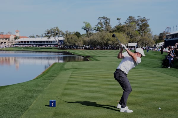 Rory McIlroy hits his tee shot on the 18th hole during the second round of The Players Championship golf tournament Friday, March 14, 2025, in Ponte Vedra Beach, Fla. (AP Photo/Chris O'Meara)