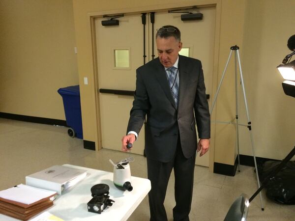 DeKalb Director of Watershed Management Scott Towler shows the county’s new smart water meters on Dec. 1. These meters will be installed across the county and transmit water usage information as part of an effort to improve water billing accuracy. (MARK NIESSE / MARK.NIESSE@AJC.COM)