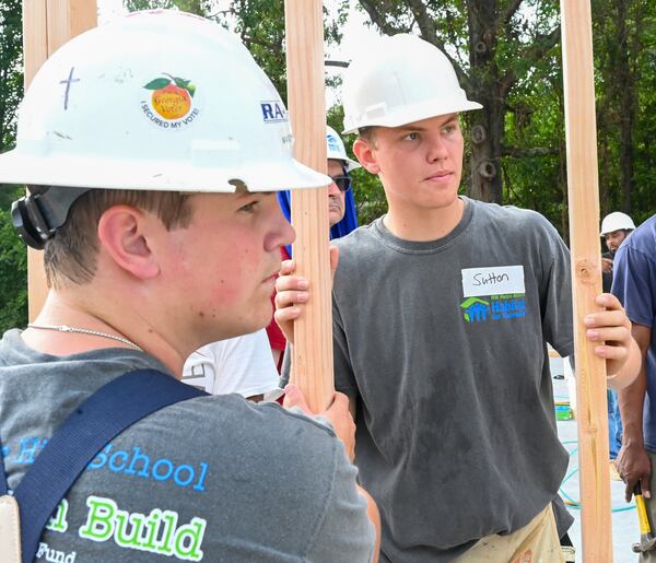 Sutton Cadman listens to instructions during the first day of the Habitat home build in Veterans Place. Photo contributed by Dolly Purvis for Habitat for Humanity of Northwest Metro Atlanta