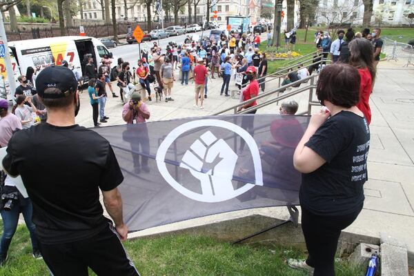 A crowd gathers Saturday, March 27, 2021, at Atlanta City Hall for a rally protesting the state's overhaul of voting laws this past week. (Photo: Steve Schaefer for The Atlanta Journal-Constitution)