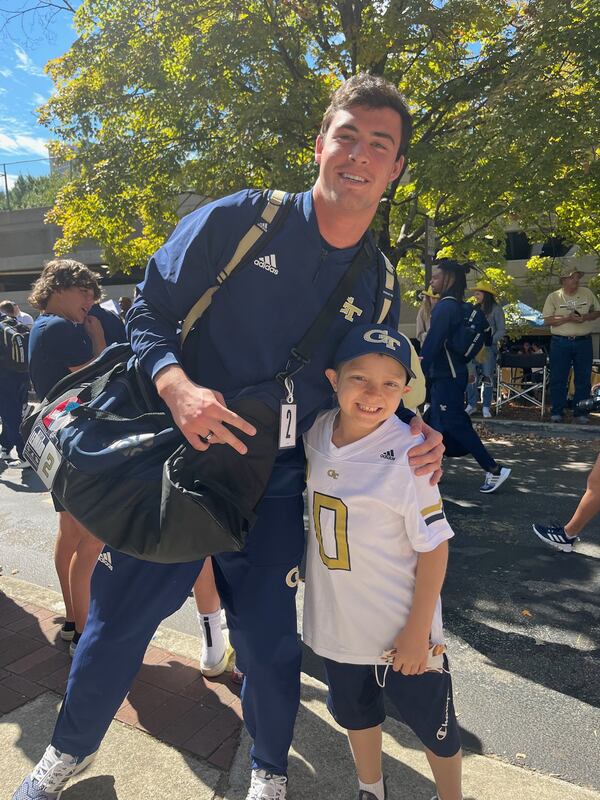 Georgia Tech tight end Dylan Leonard, with friend Brentley Russell, outside Bobby Dodd Stadium before a game this season. Leonard and Brentley met at Children's Scottish Rite Hospital in Atlanta. (Photo courtesy of Dylan Leonard).