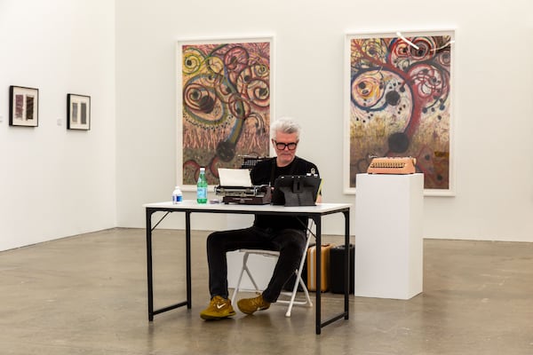 Tim Youd is shown retyping Tayari Jones’ “An American Marriage” at Atlanta Contemporary on June 22, 2024.