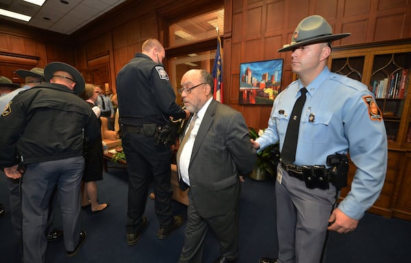 Ten protesters, including state Sen Vincent Fort, were arrested in Gov. Nathan Deal’s office shortly after 5 p.m. Monday. Georgia’s “Moral Mondays” organizers, hoping to turn up the heat on the issue of Medicaid expansion, planned a “sit-in” hoping to meet with Deal and deliver a letter to him. The “Moral Mondays” movement began in North Carolina, and protests there resulted in many arrests. These are the first arrests associated with the movement in Georgia. KENT D JOHNSON/KDJOHNSON@AJC.COM