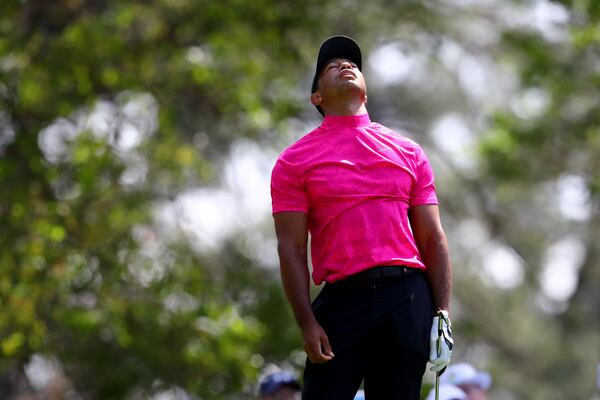 Tiger Woods reacts after his tee shot on the fourth hole during the first round of the Masters at Augusta National Golf Club on Thursday, April 7, 2022, in Augusta. (Curtis Compton / Curtis.Compton@ajc.com)