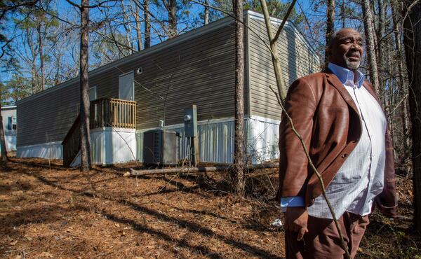  Peter Byrd stands in the front yard of his Douglasville home Friday, February 11, 2022. STEVE SCHAEFER FOR THE ATLANTA JOURNAL-CONSTITUTION. 