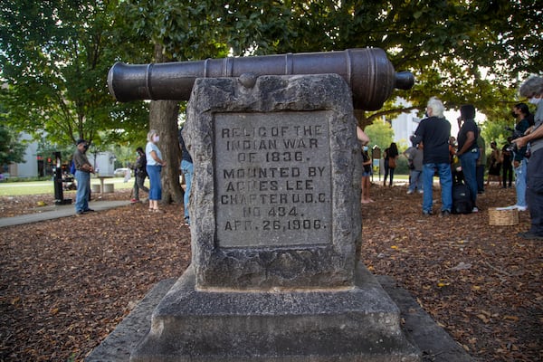 10/11/2021 — Decatur, Georgia —A  cannon monument, installed by the United Daughters of the Confederacy in 1906, is displayed near the Old DeKalb County courthouse  in downtown Decatur, Monday, October 11, 2021. (Alyssa Pointer/ Alyssa.Pointer@ajc.com)