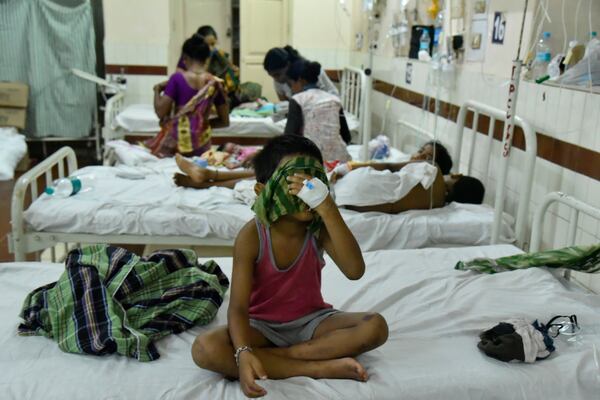 Children receive treatment at a hospital after a chemical gas leak in India.